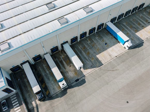 Trucks at a distribution warehouse.