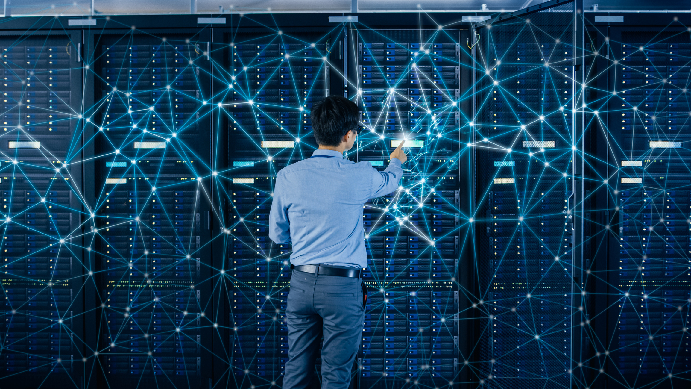 An IT professional checks a server.