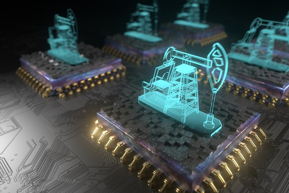 Oil pumpjacks on top of silicon chips illustrates an abstract bitcoin mining concept.