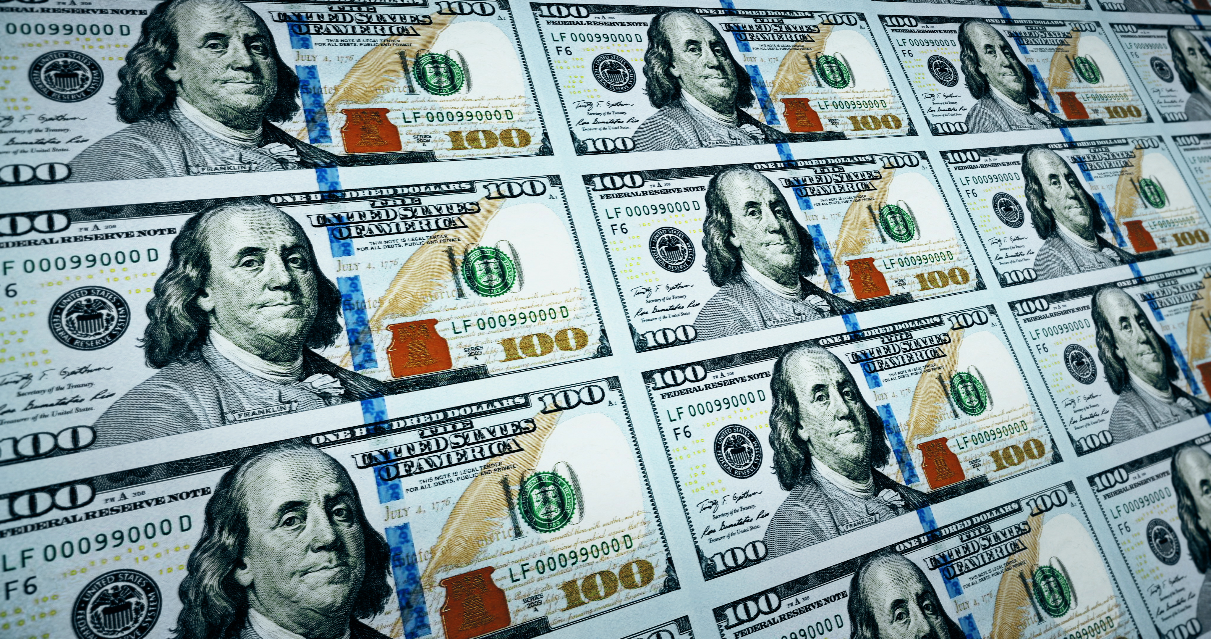 Sheets of new $100 bills