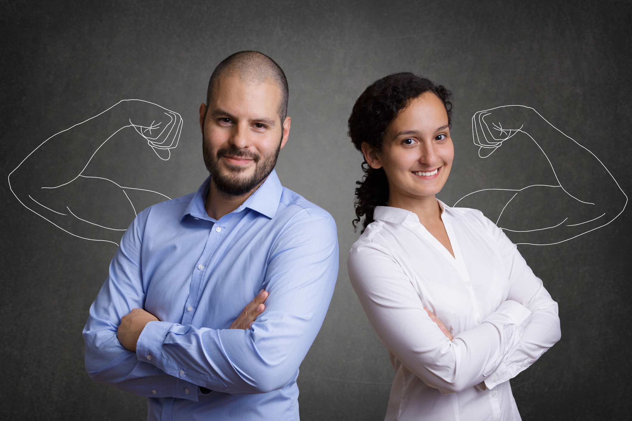 A man and woman have arms crossed, standing in front of images of muscled arms.