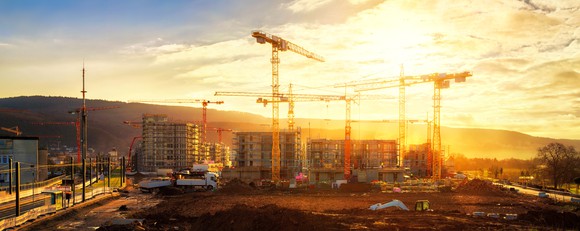 A construction site at sunrise. 