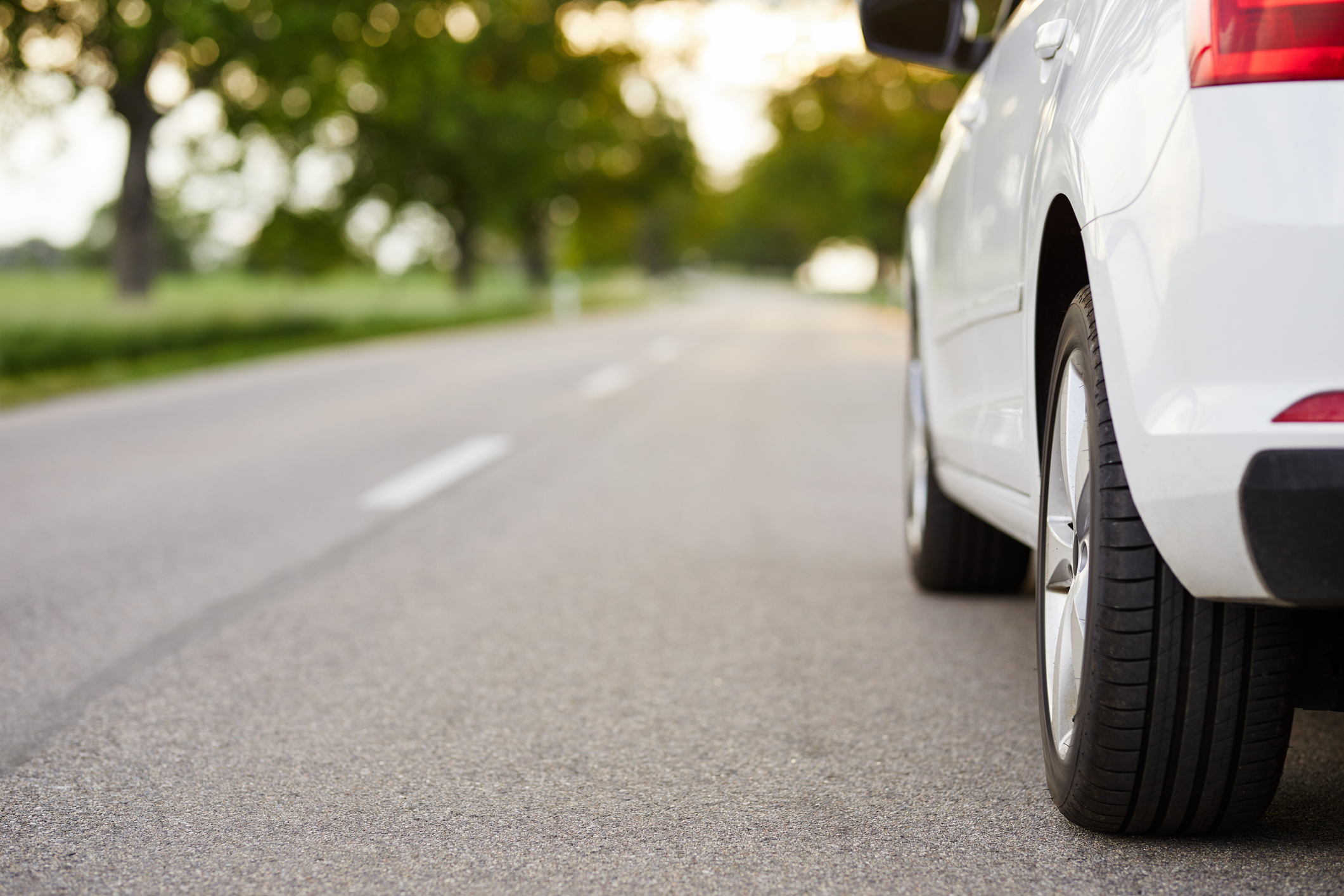 White car on an asphalt road