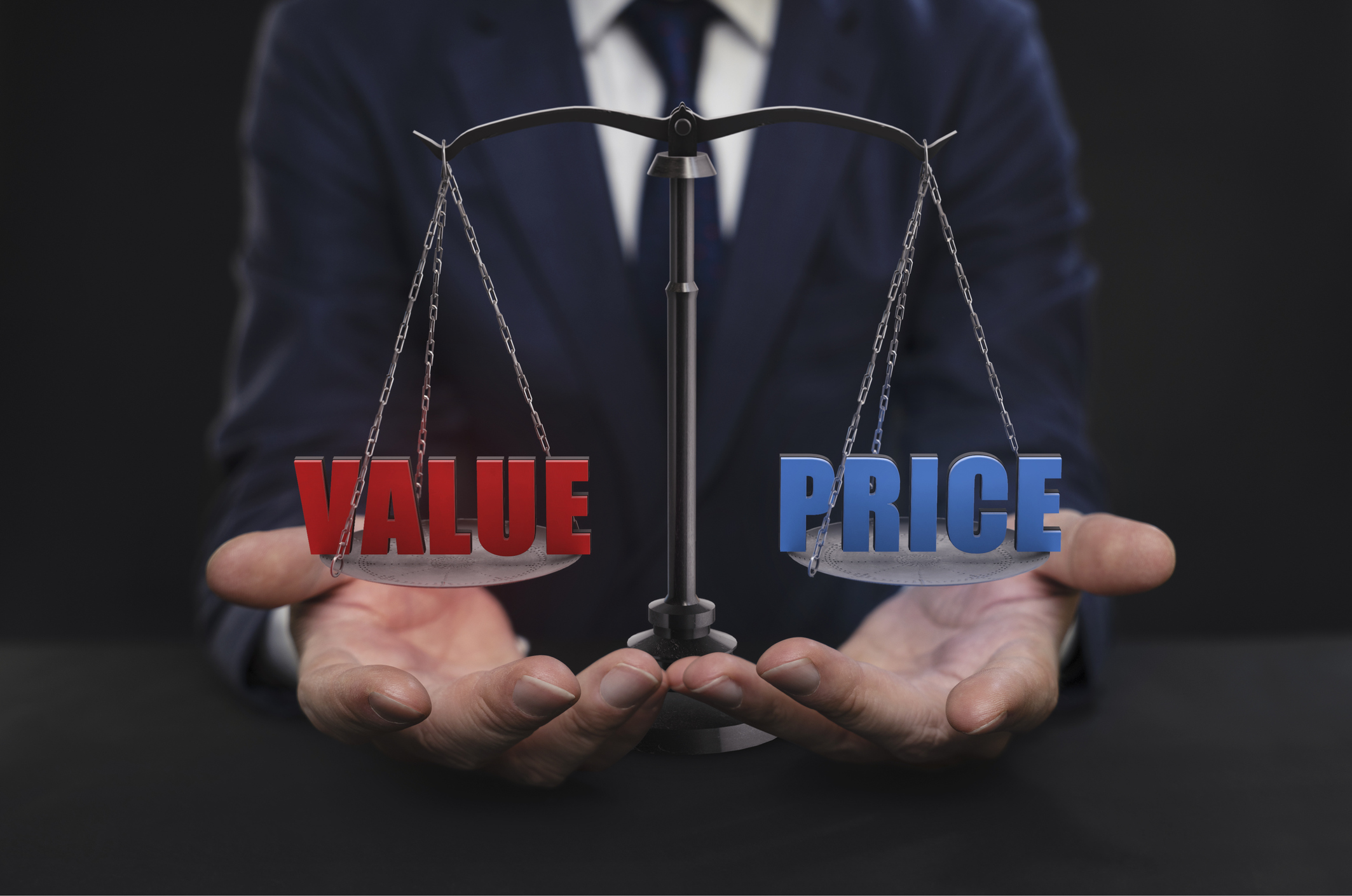 A person weighing price and value on scales.