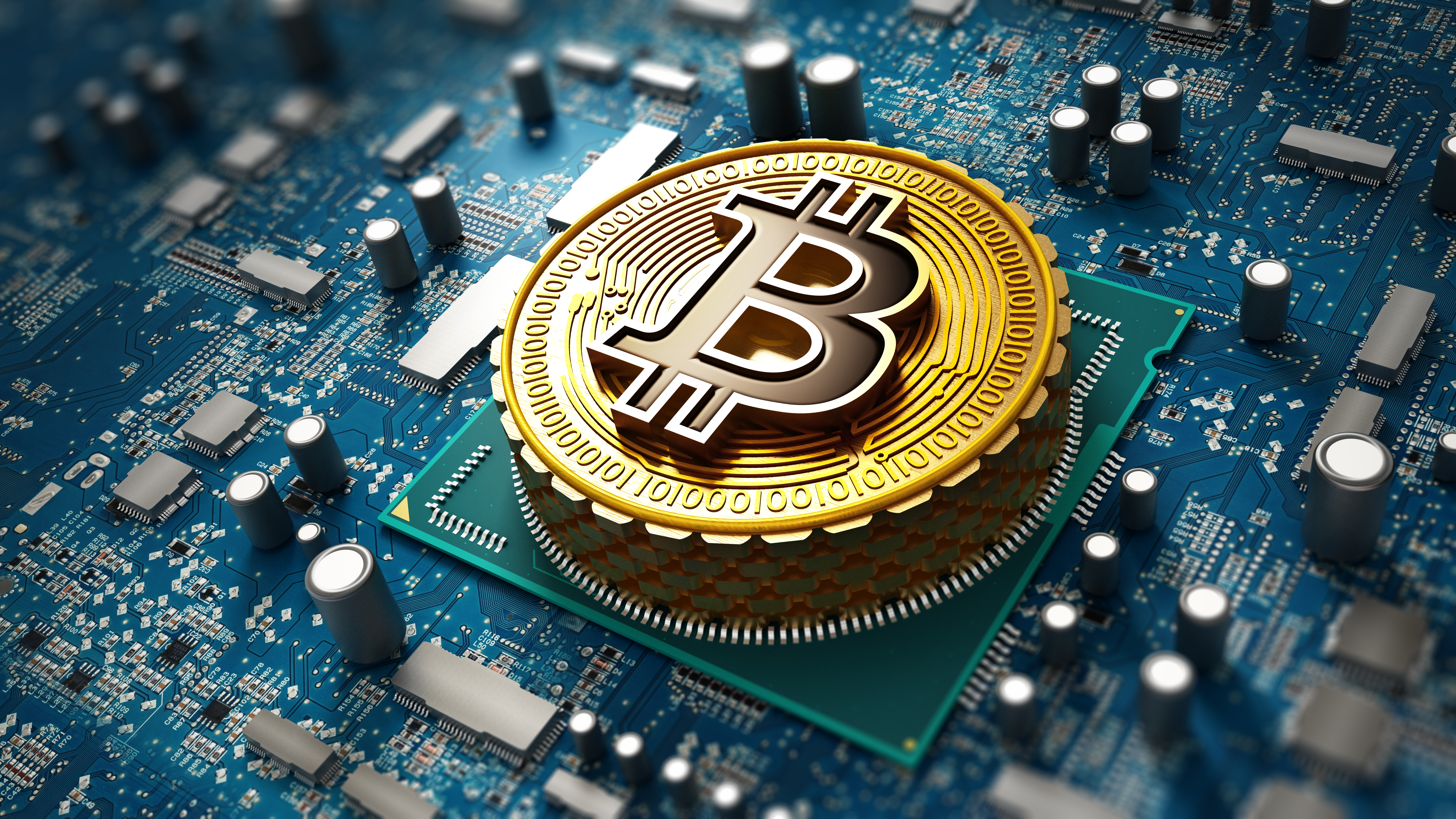 A Bitcoin icon on top of a semiconductor, illustrating digital currency.