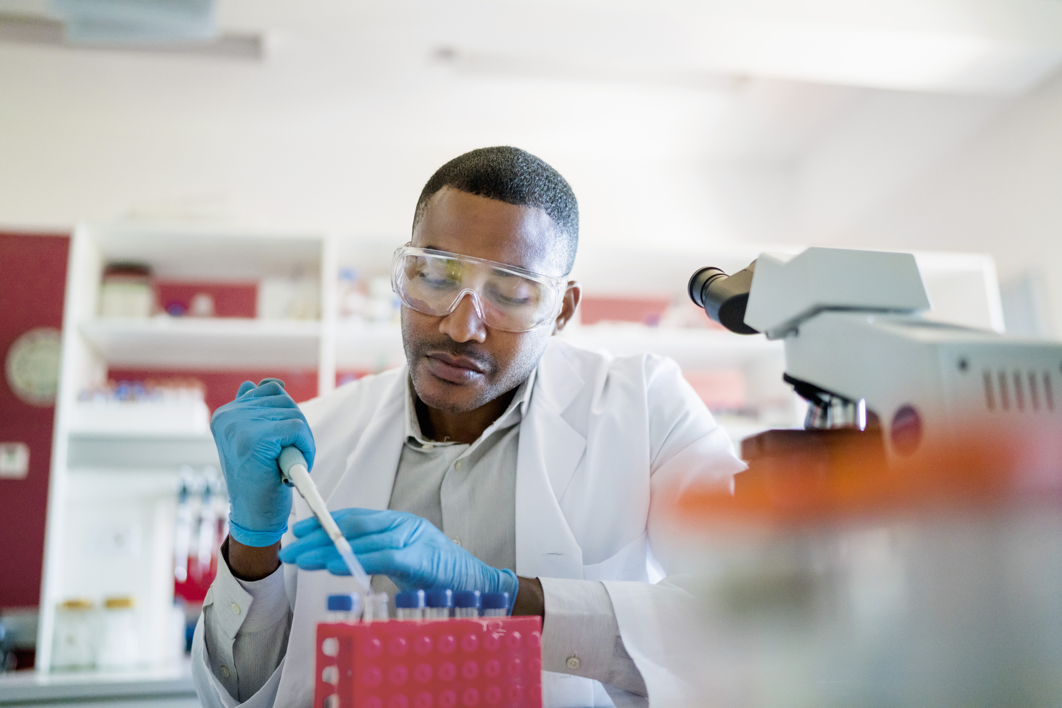 Scientist with pipette