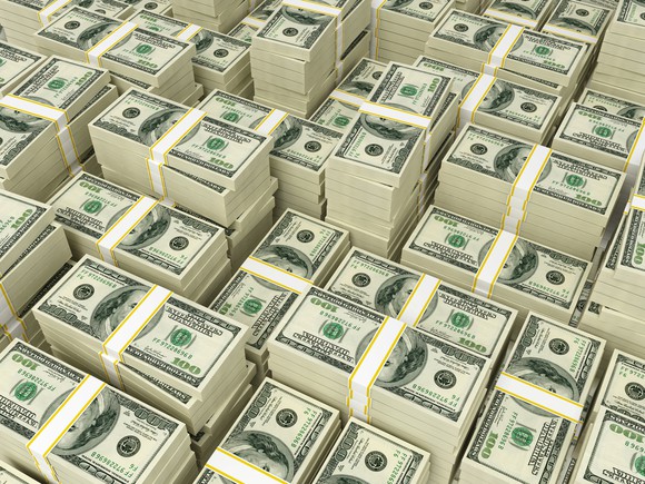 Neatly stacked and banded $100 bills.