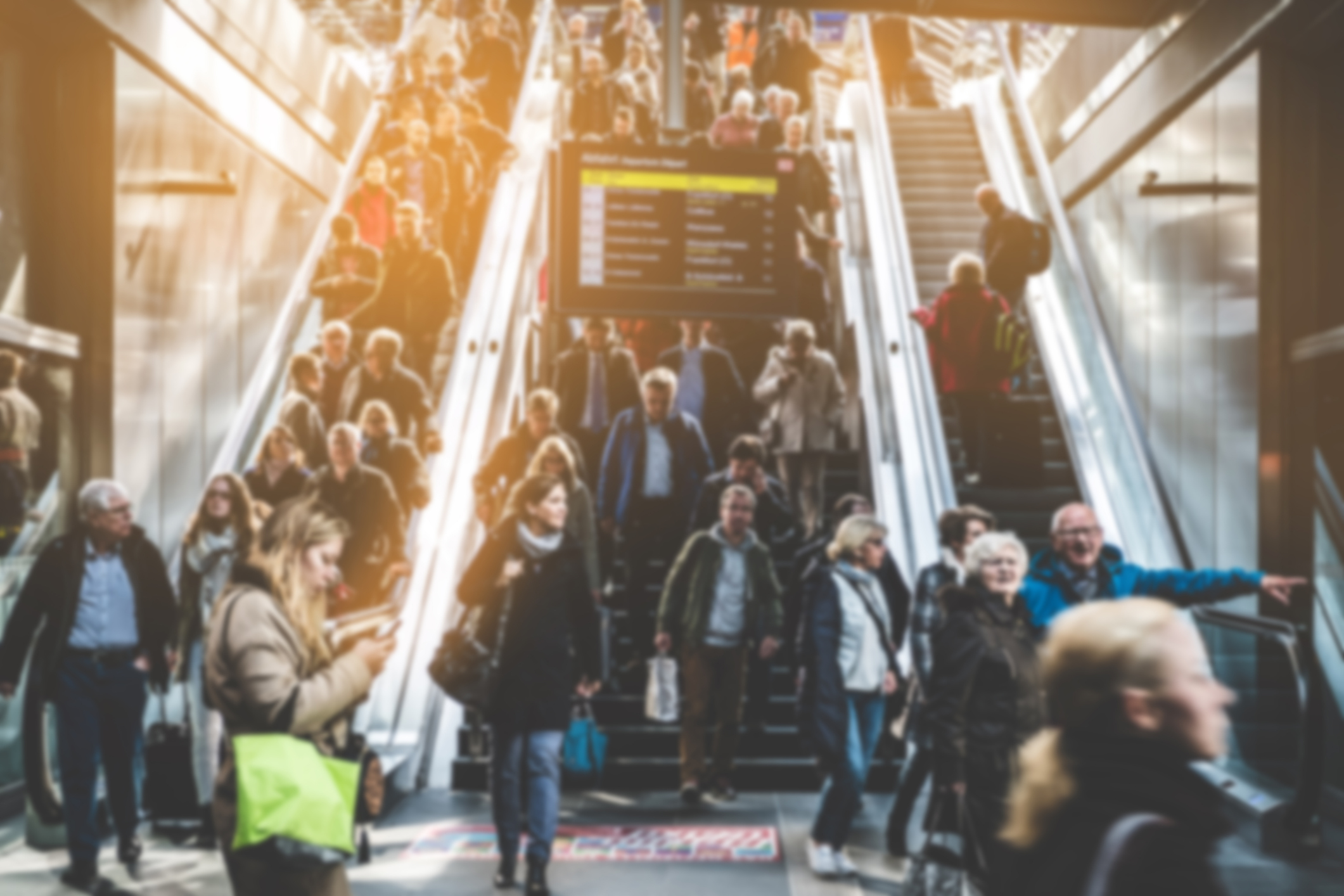 Two very crowded escalators.