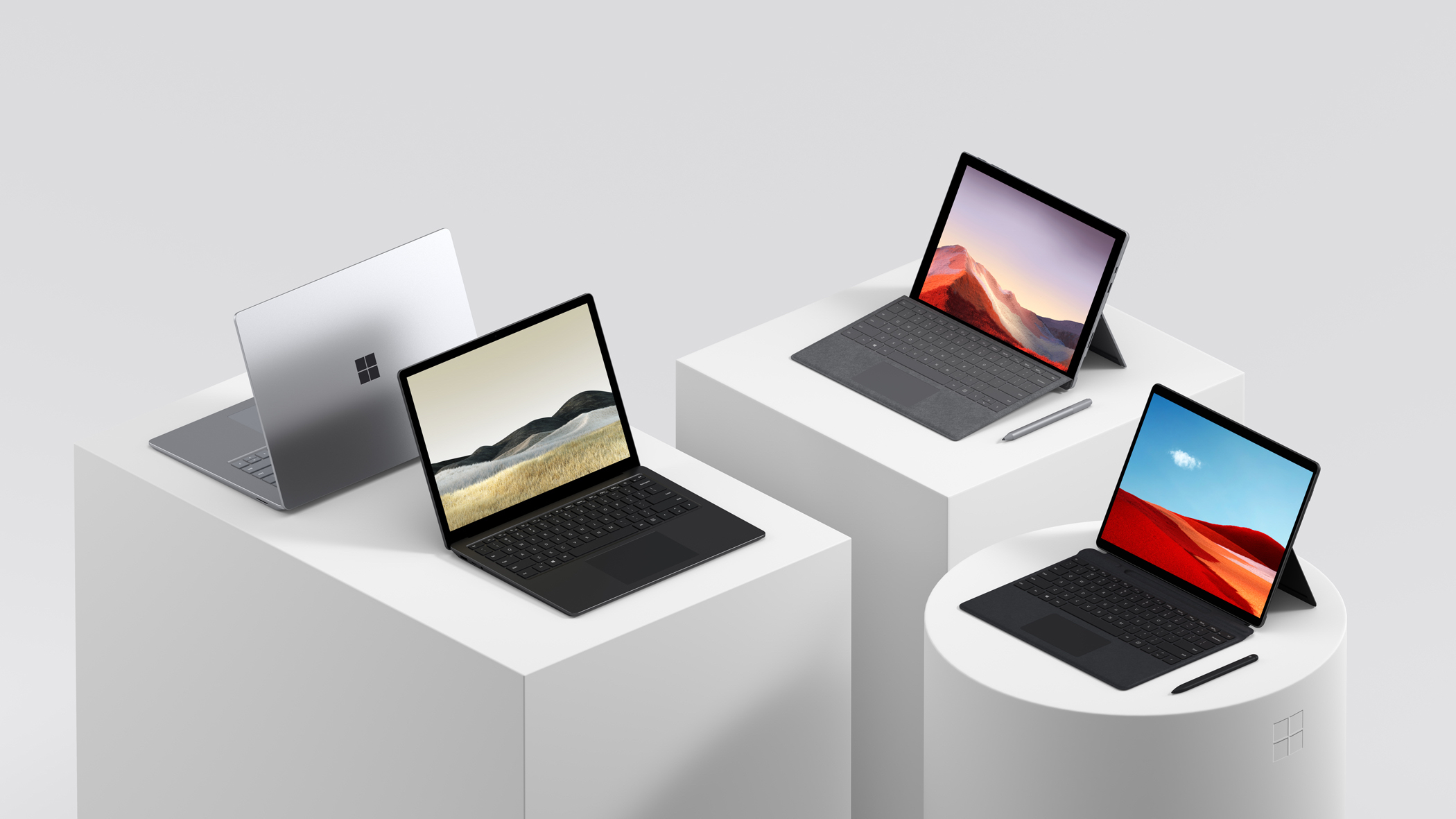 Four Microsoft surface computers.