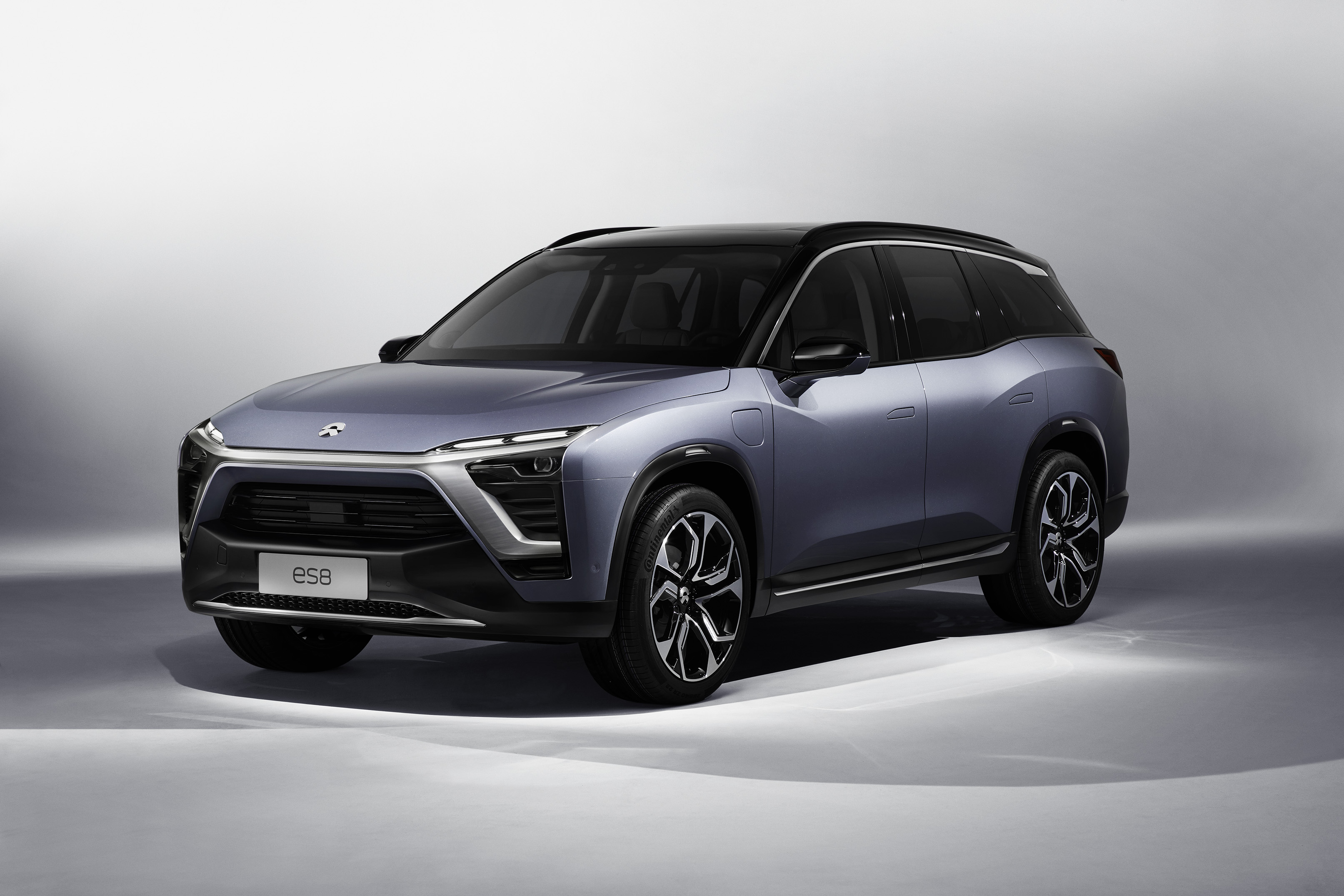 A NIO ES8 EV SUV in a showroom.
