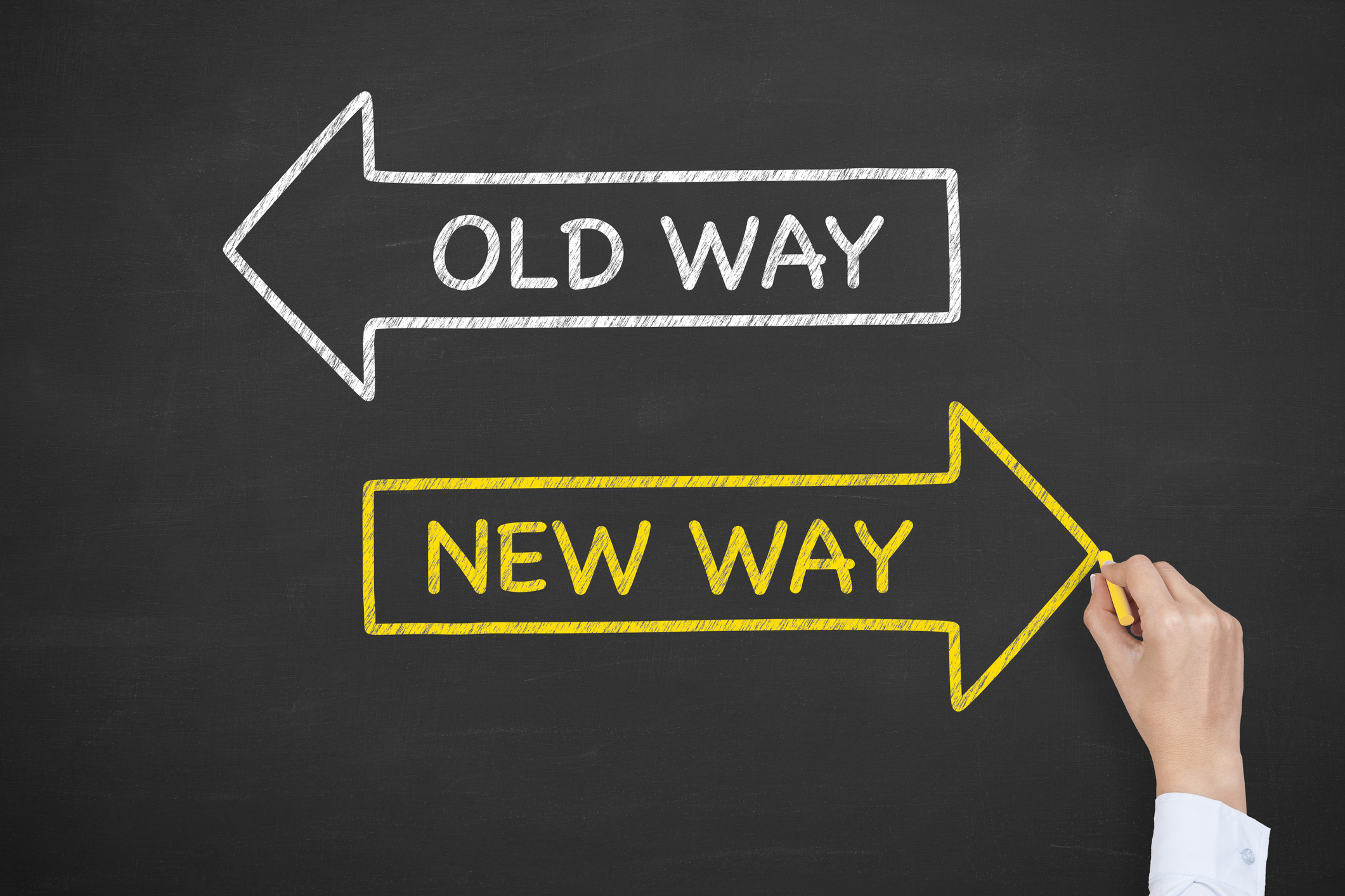 A white arrow labeled "old way" points left on a chalkboard. A yellow arrow labeled "new way" points right.