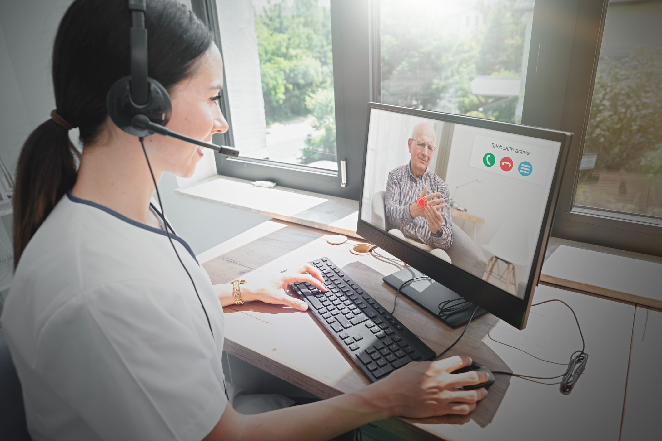A healthcare provider and patient having a telehealth appointment.