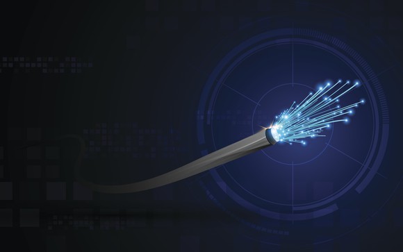 Illustration of strands of light emanating from fiber optic laser