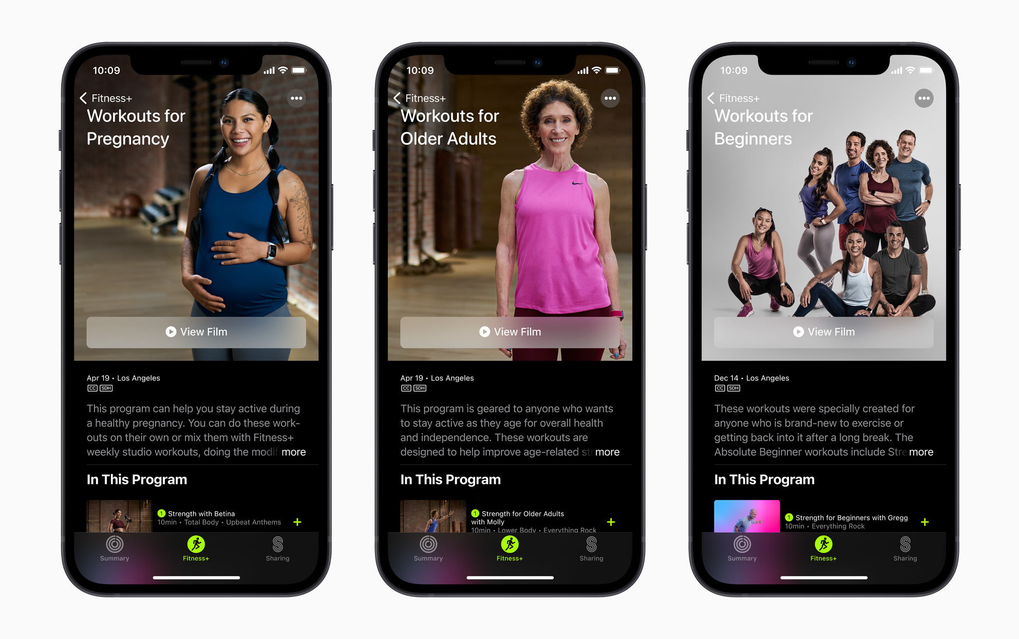 Three iPhones displaying Apple Fitness+ screens: workouts for pregnancy, workouts for older adults, and workouts for beginners.