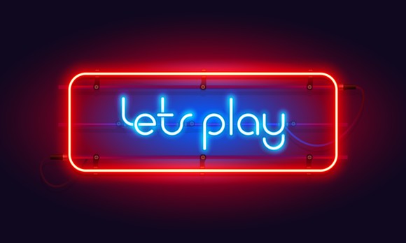 A red and blue neon light display that reads "lets play". 