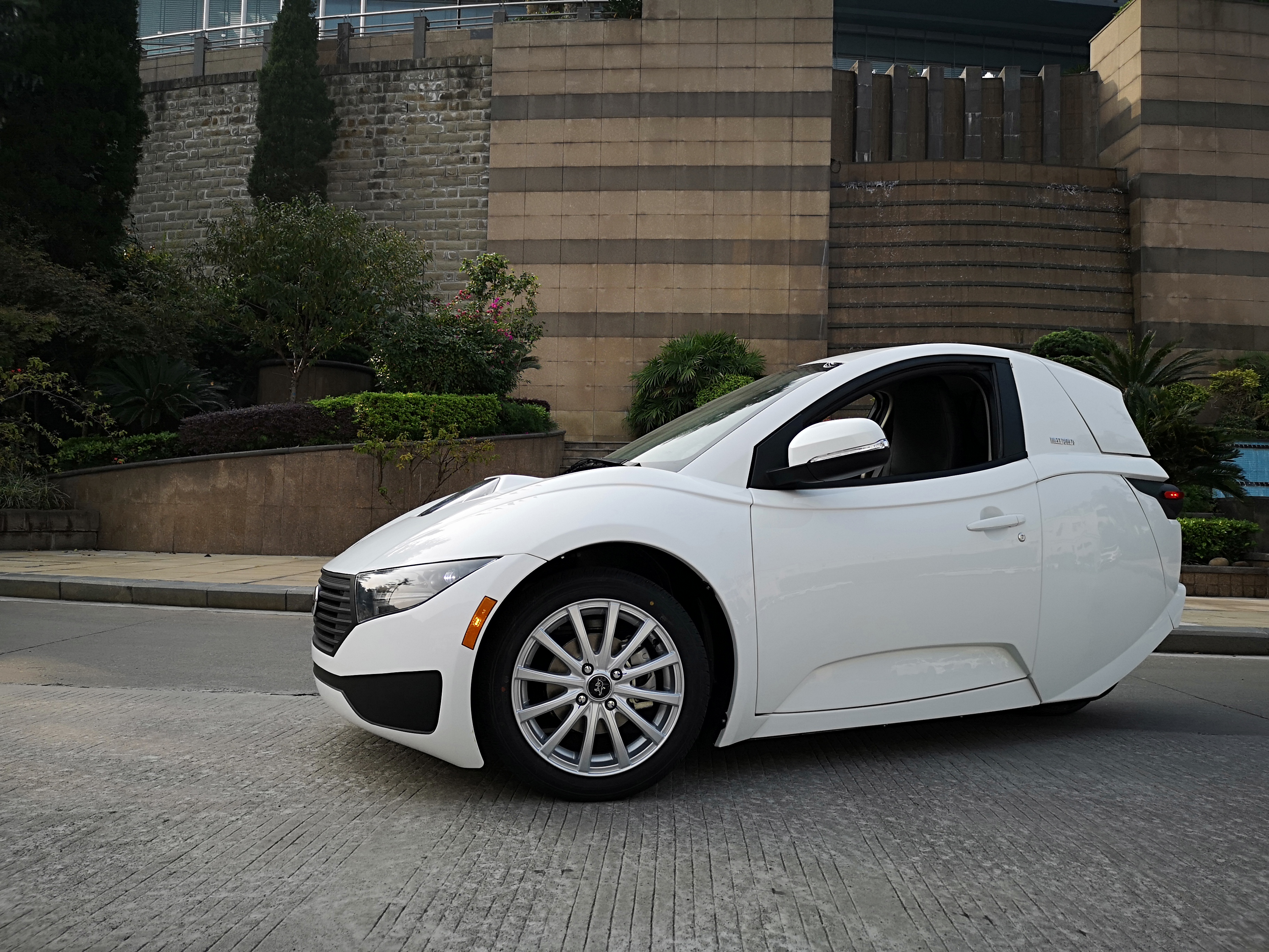white Solo three-wheeled electric vehicle
