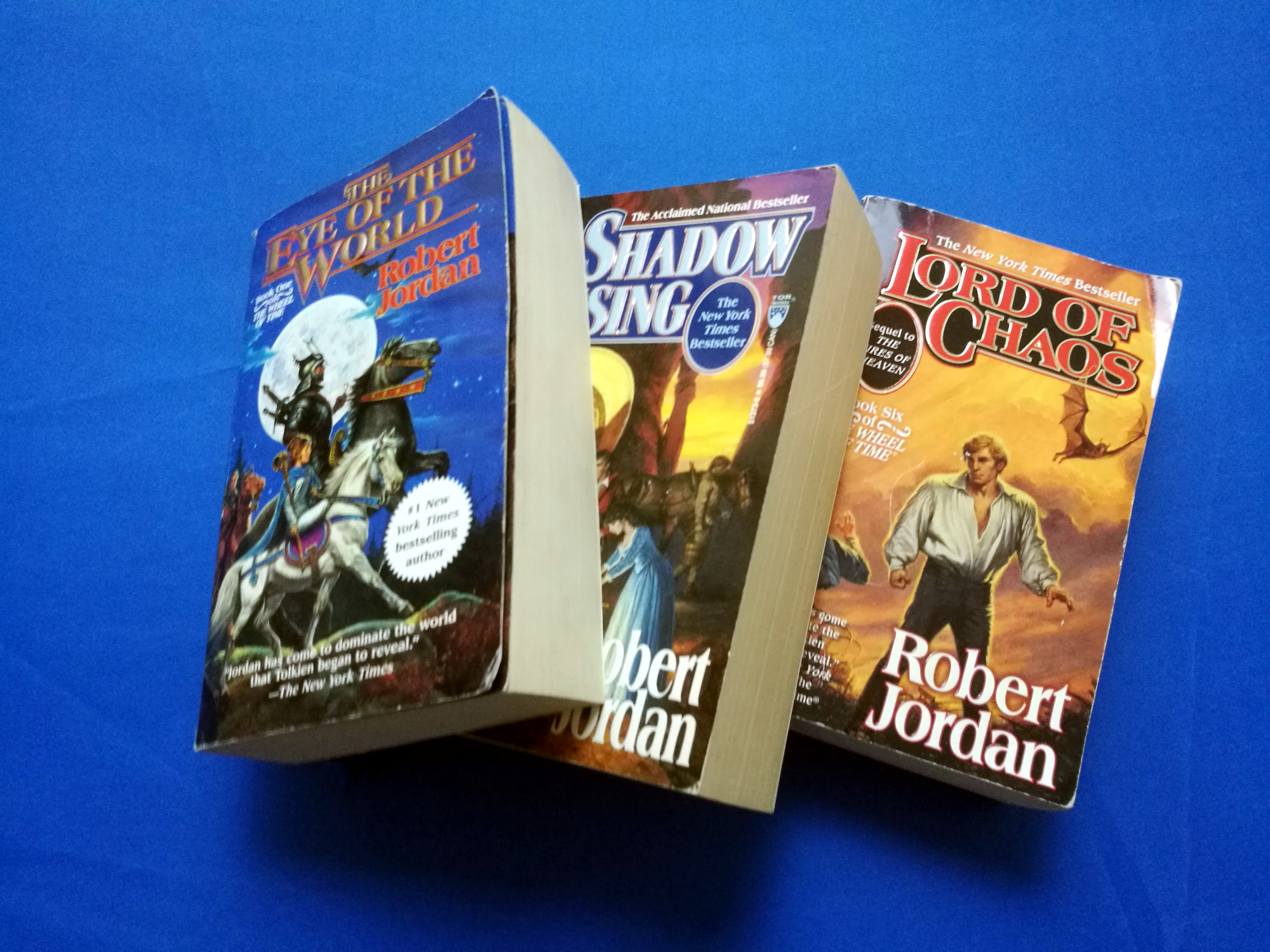 Three books from Robert Jordan's Wheel of Time series.