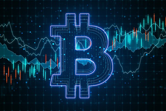 Blue Bitcoin logo on graphic screen
