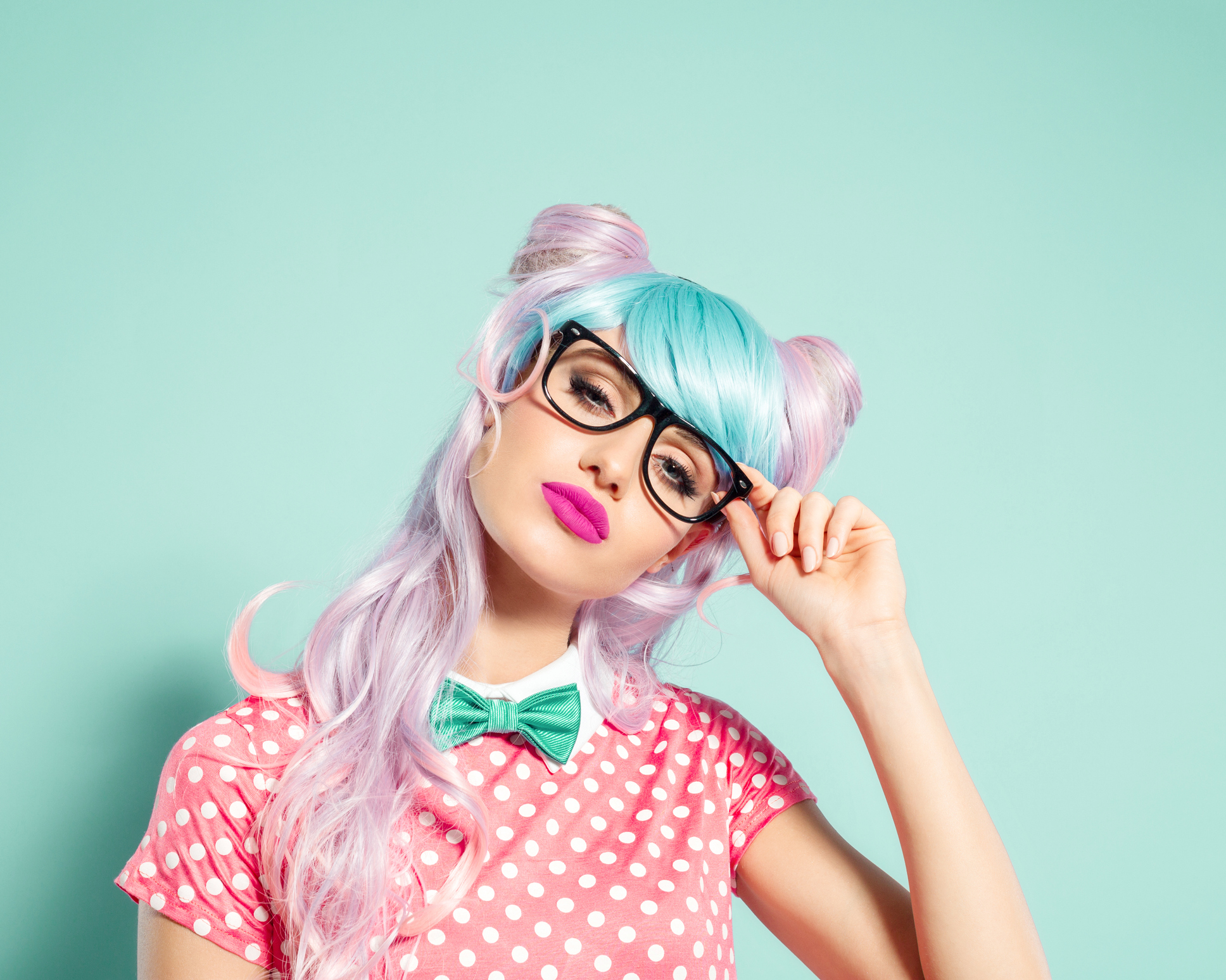 A person dressed as an anime character with dyed hair.