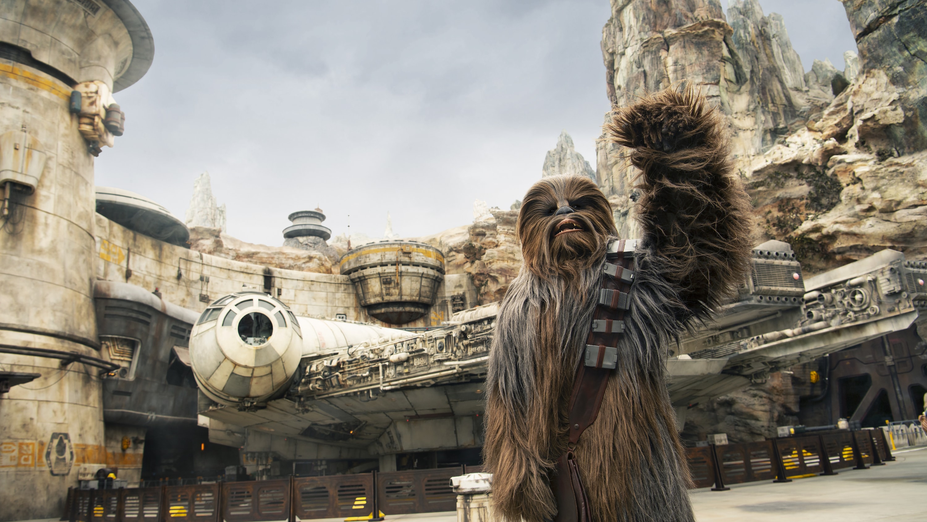 Star Wars' Chewbacca waving at a Star Wars attraction at Disney Hollywood Studios.