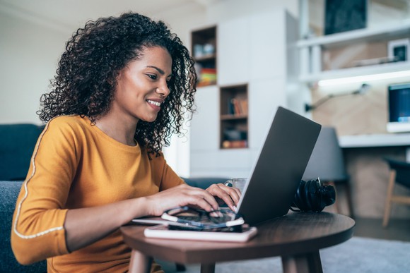 A laptop user browses the web.