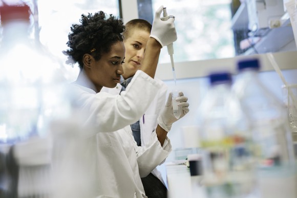 Two researchers working in a lab.