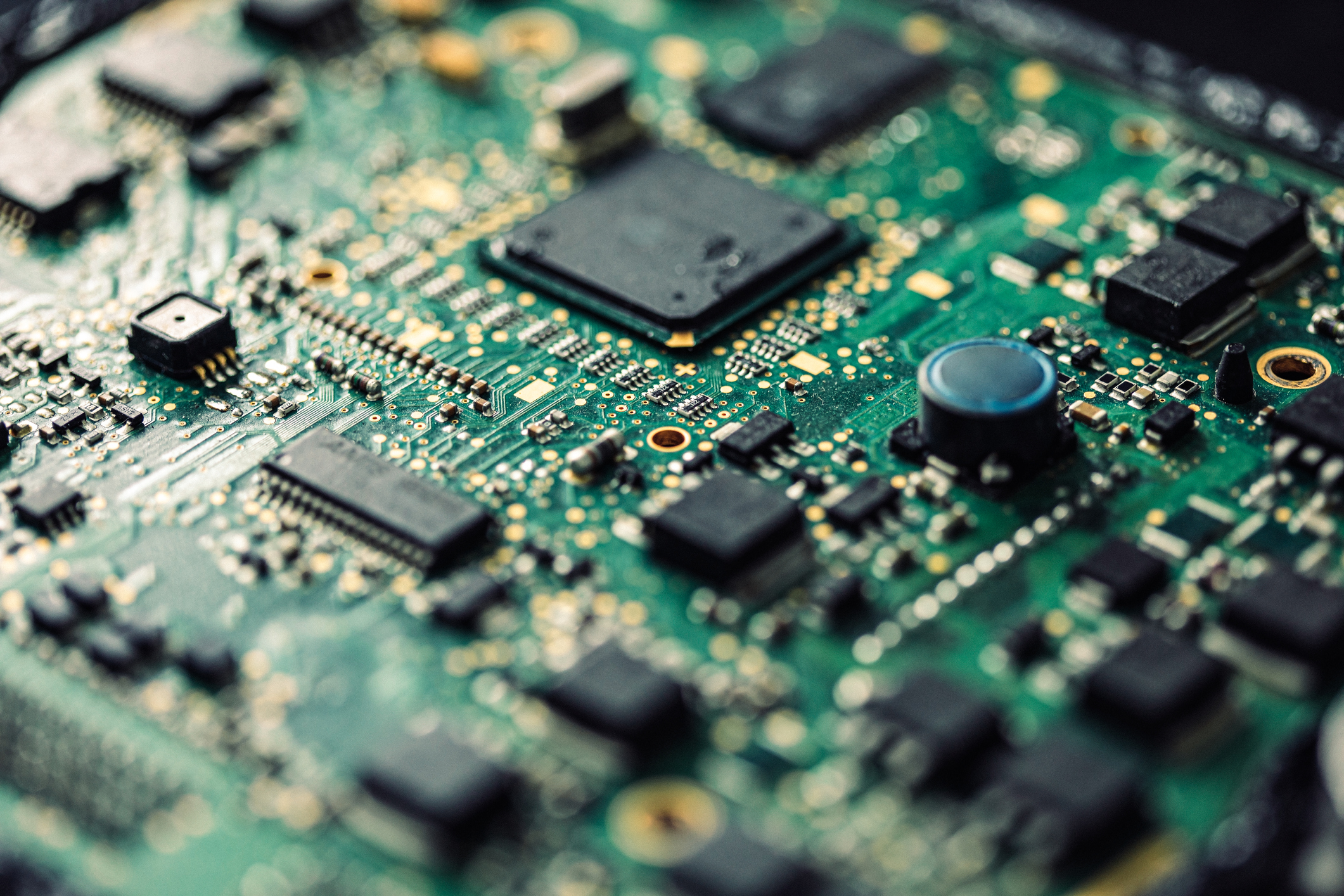 A printed circuit board with chips on it.