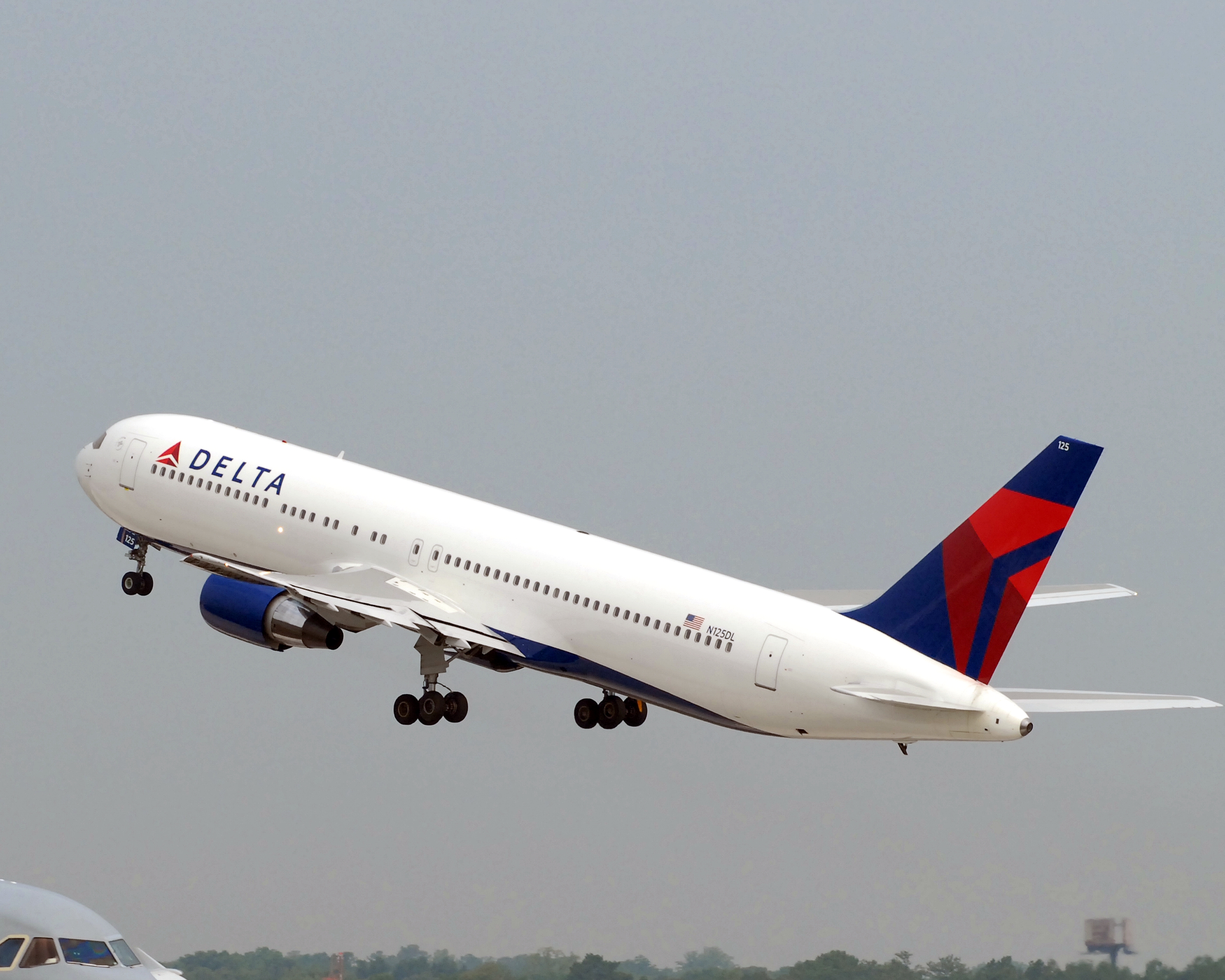 A Delta Air Lines plane taking off.