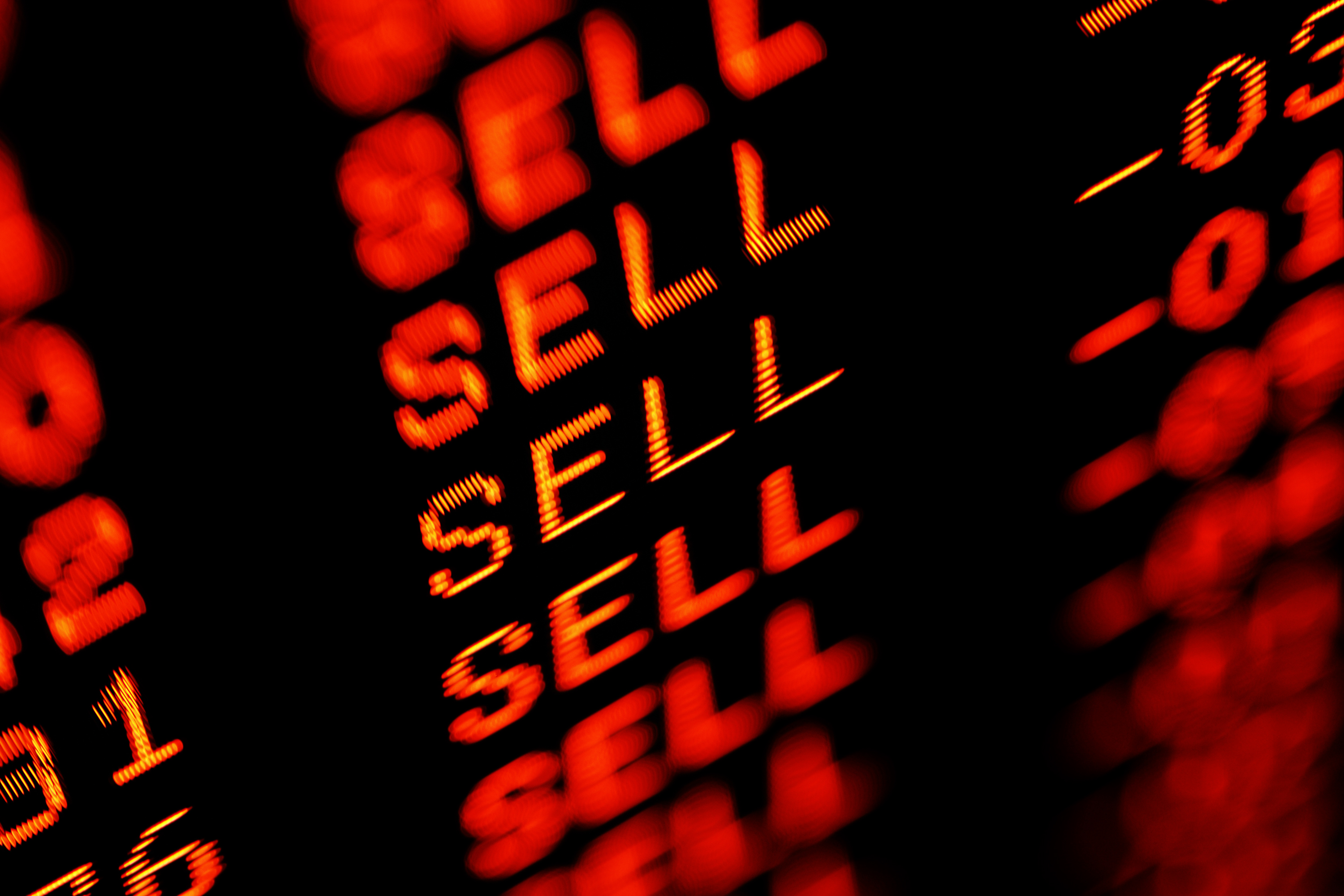 stock screen with sell sell sell in all red