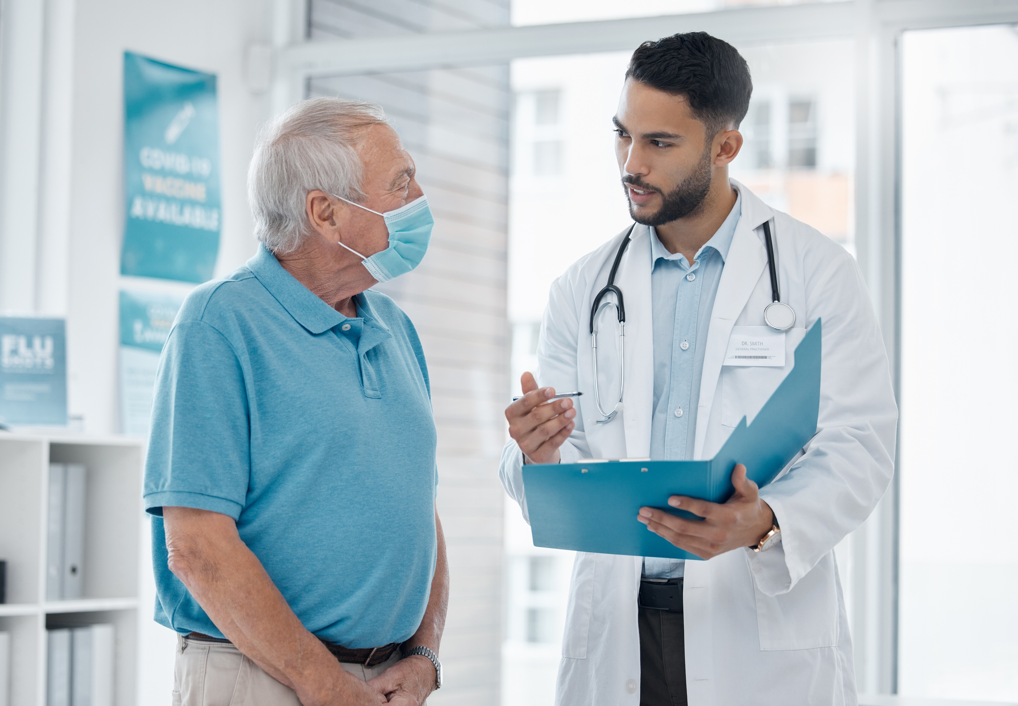 A doctor speaks with a patient.