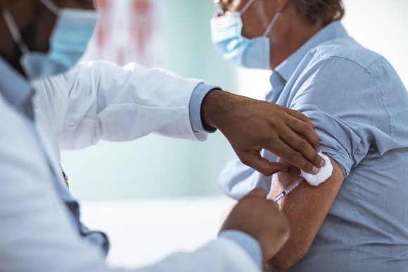 Person receiving an injection.