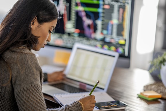 A person analyzing an investment.