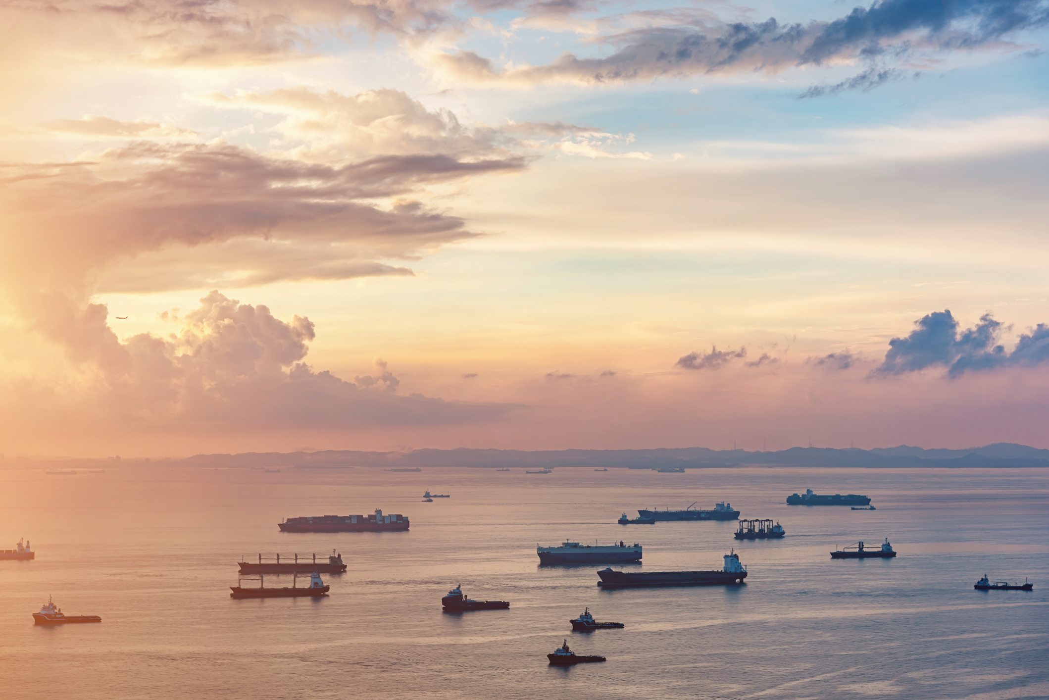Aerial view of container ships waiting to dock.