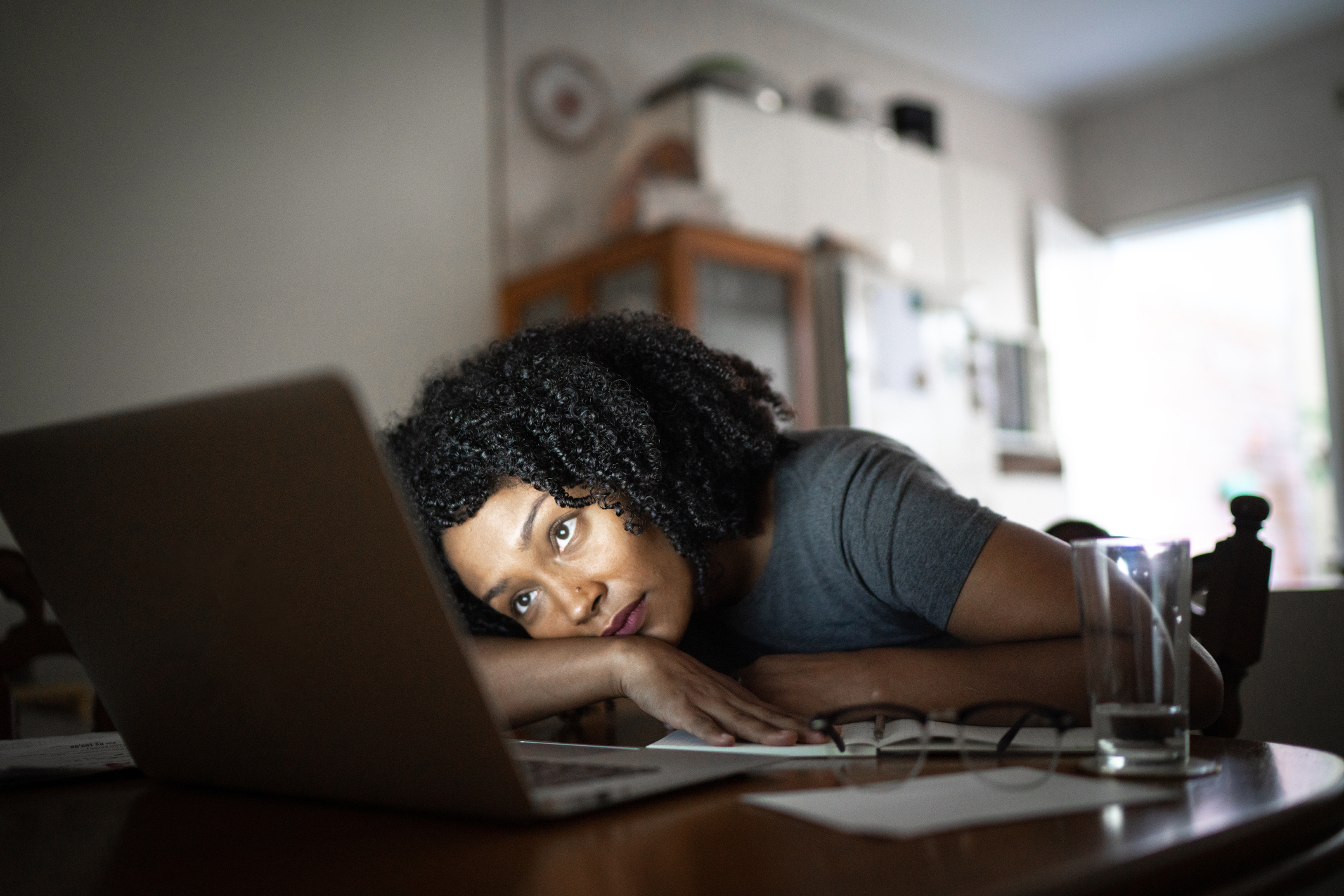 A person looking at a laptop.