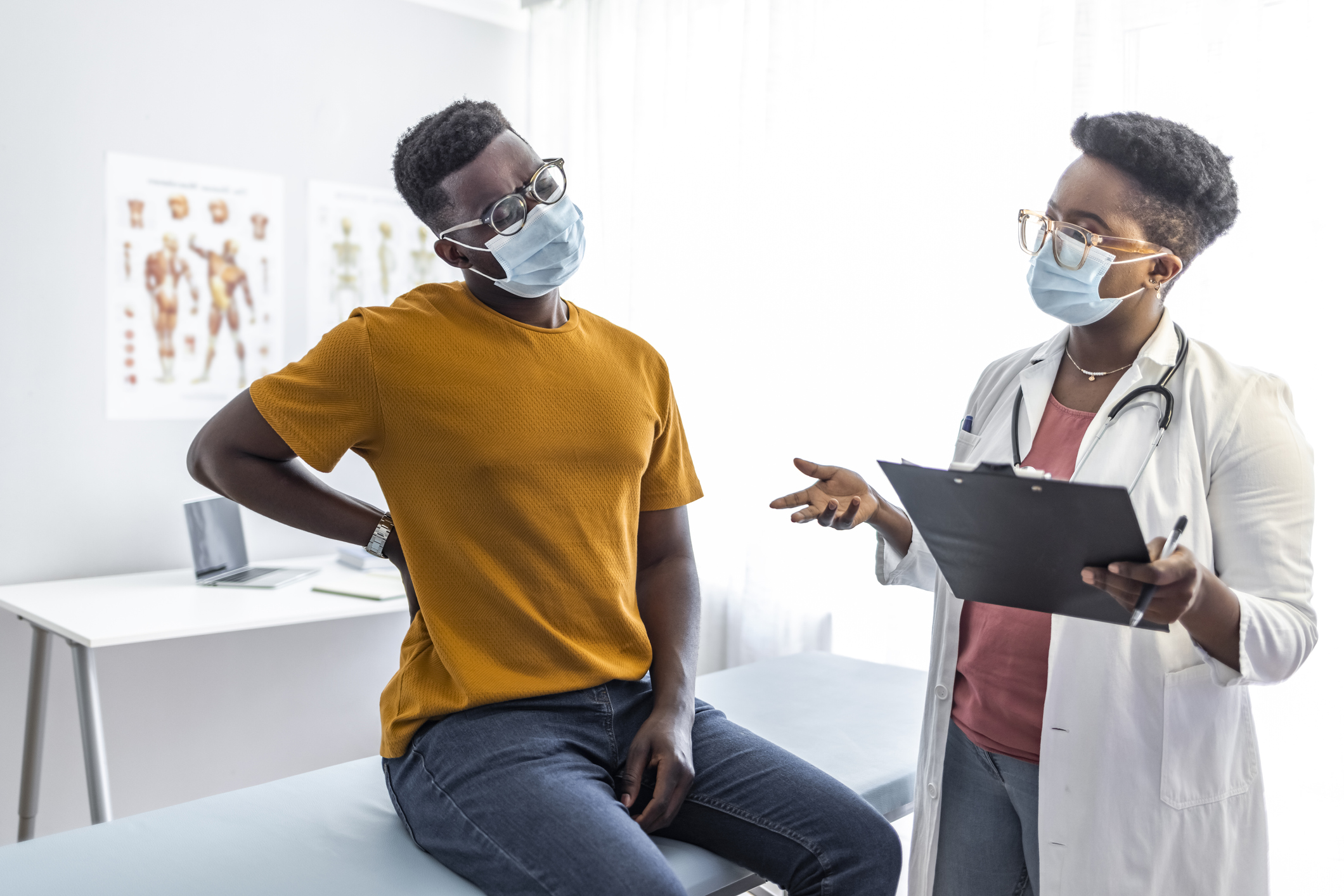 A patient at an appointment with their doctor.