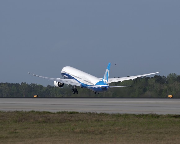 A Boeing 787-10 Dreamliner taking off.