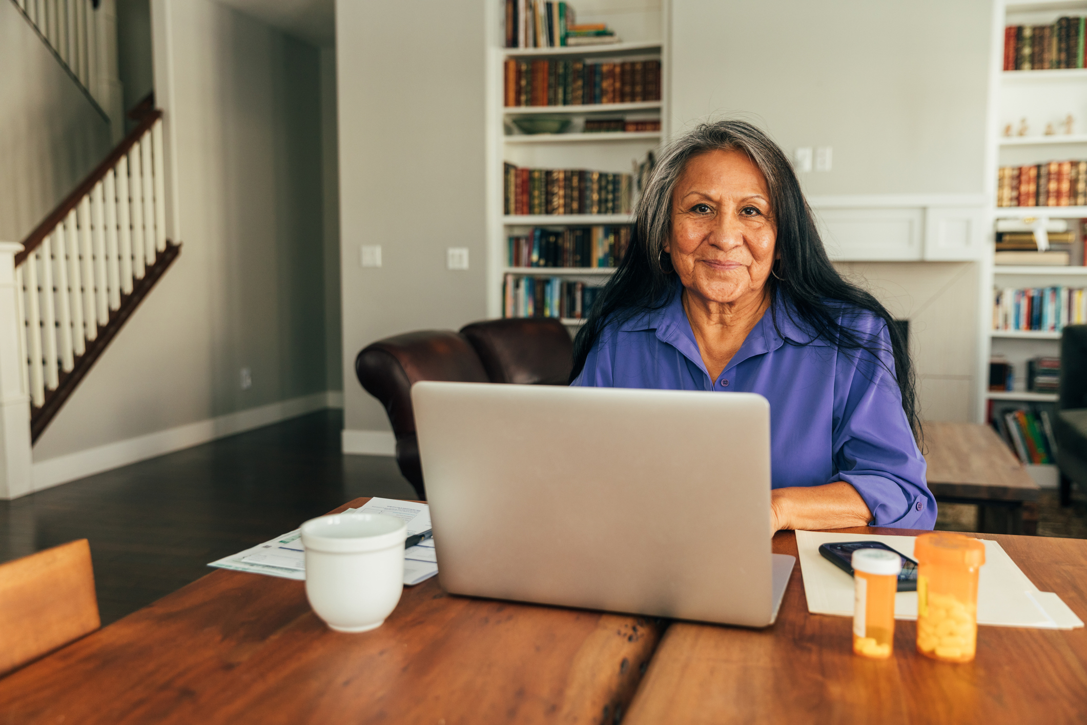 Woman sitting at computer.
