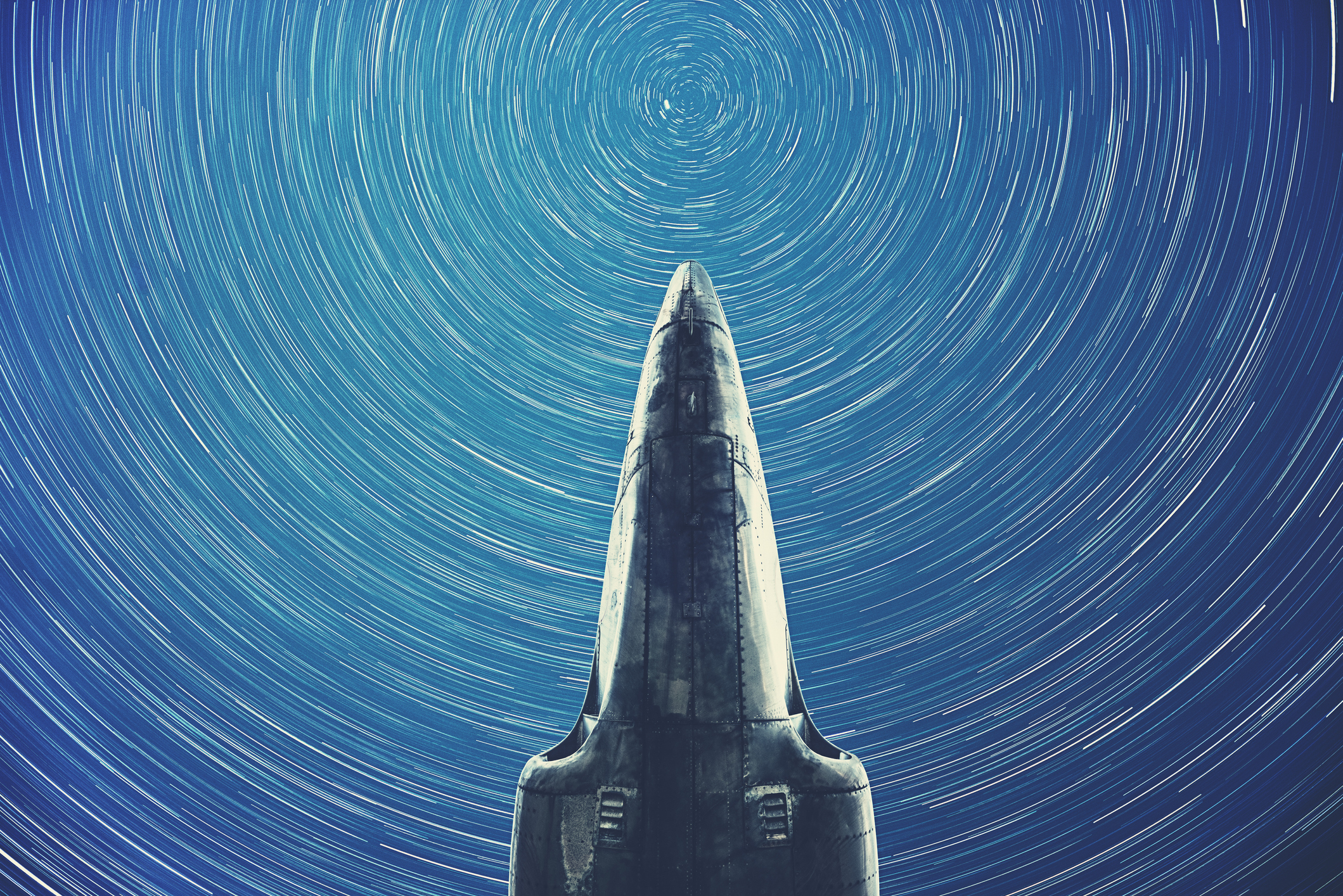 A rocket pointing toward the stars.