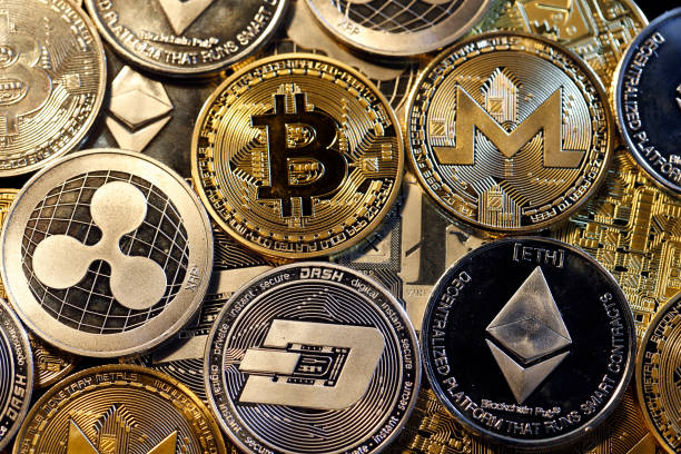 An assortment of digital currencies represented as coins.
