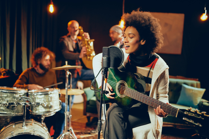 Musicians performing in a studio
