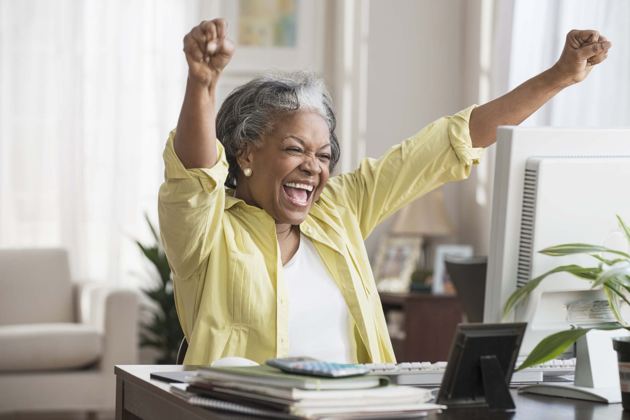 11-senior-celebrating-at-desk