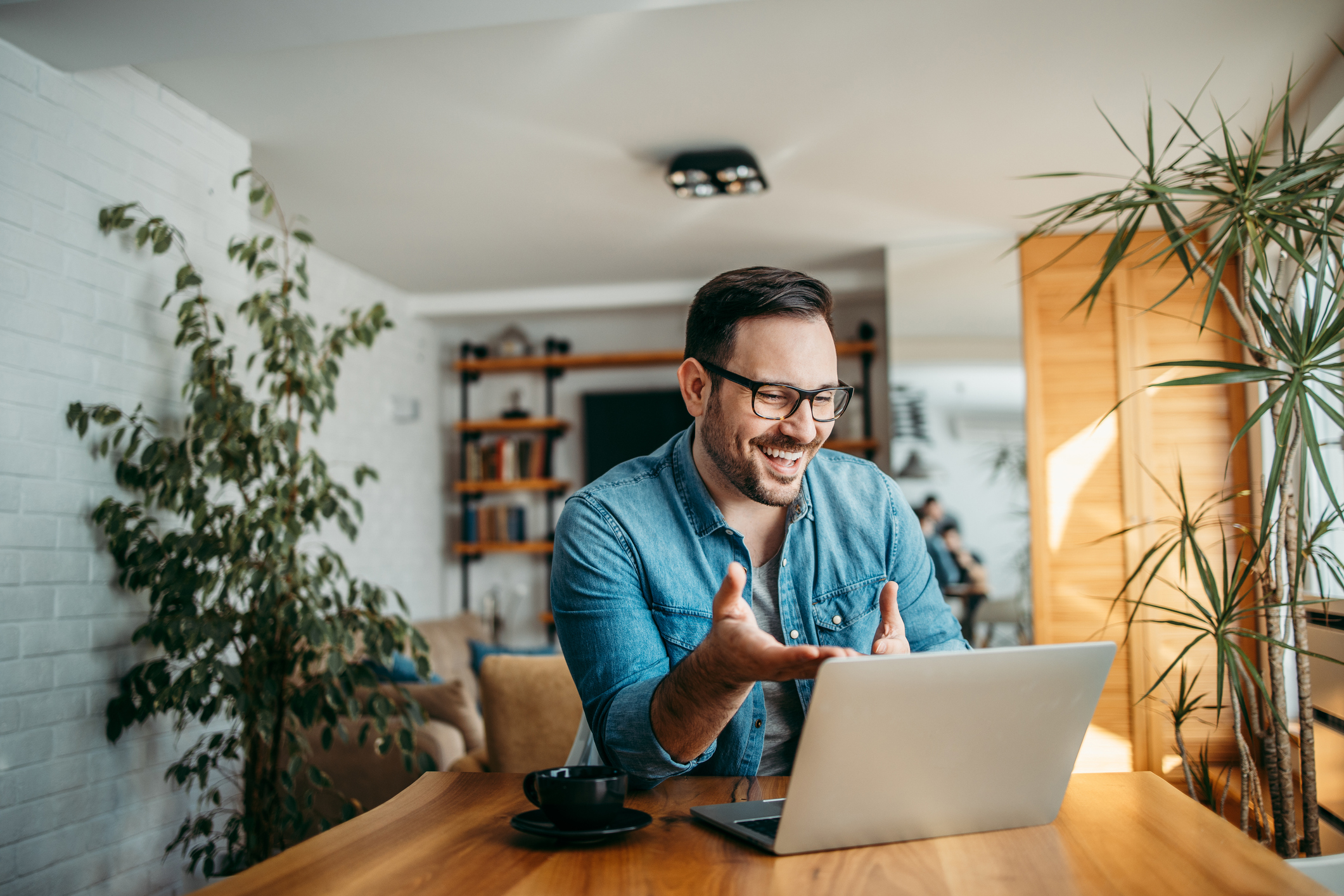 A man making a video call from home.