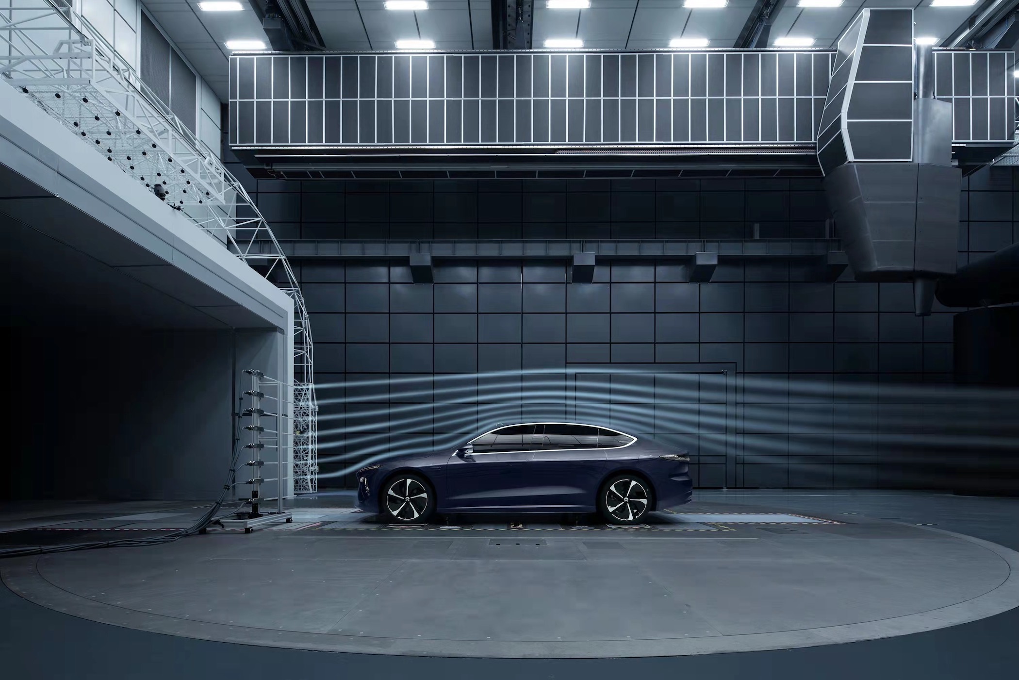 Nio ET7 luxury electric sedan in aerodynamic testing.