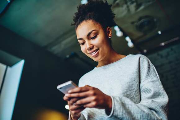 Person holding smartphone.