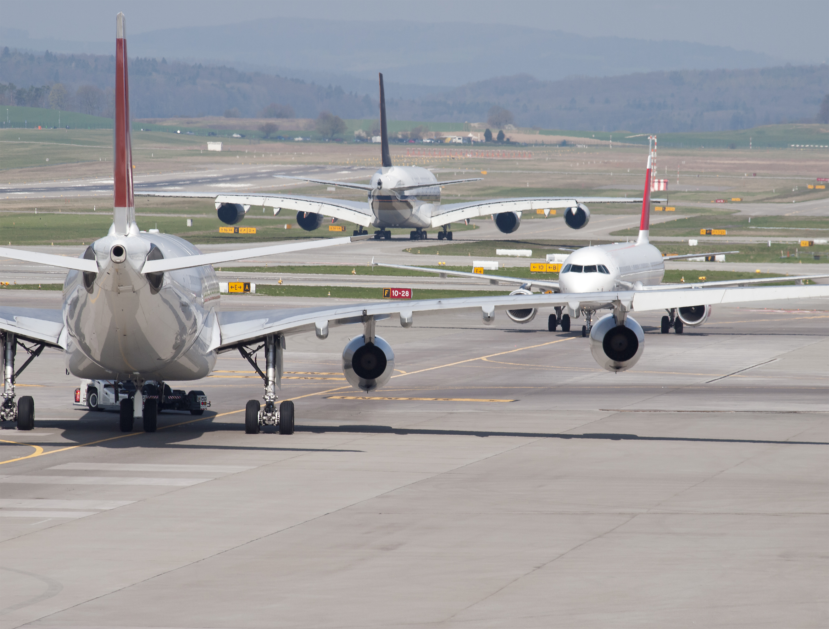 Passenger jets stuck on an airport tarmac.