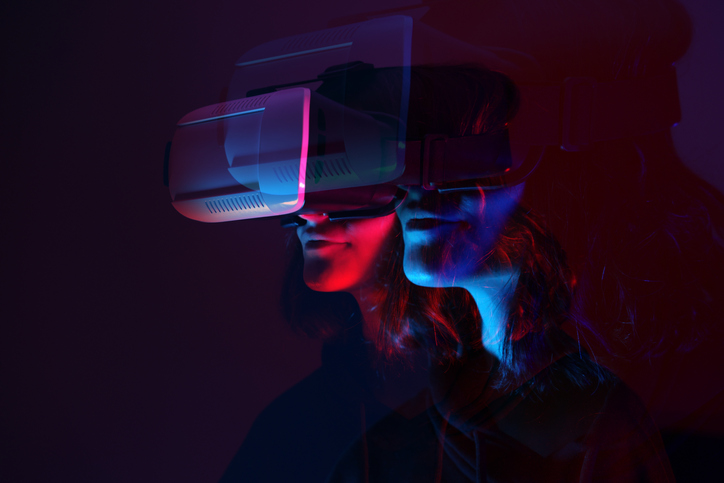 Person wearing virtual reality goggles.