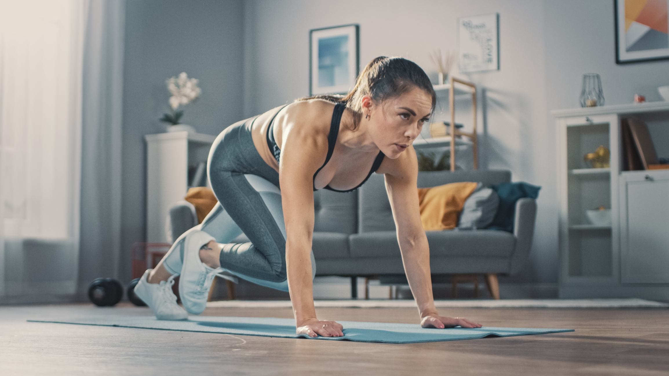 A person exercising at home.