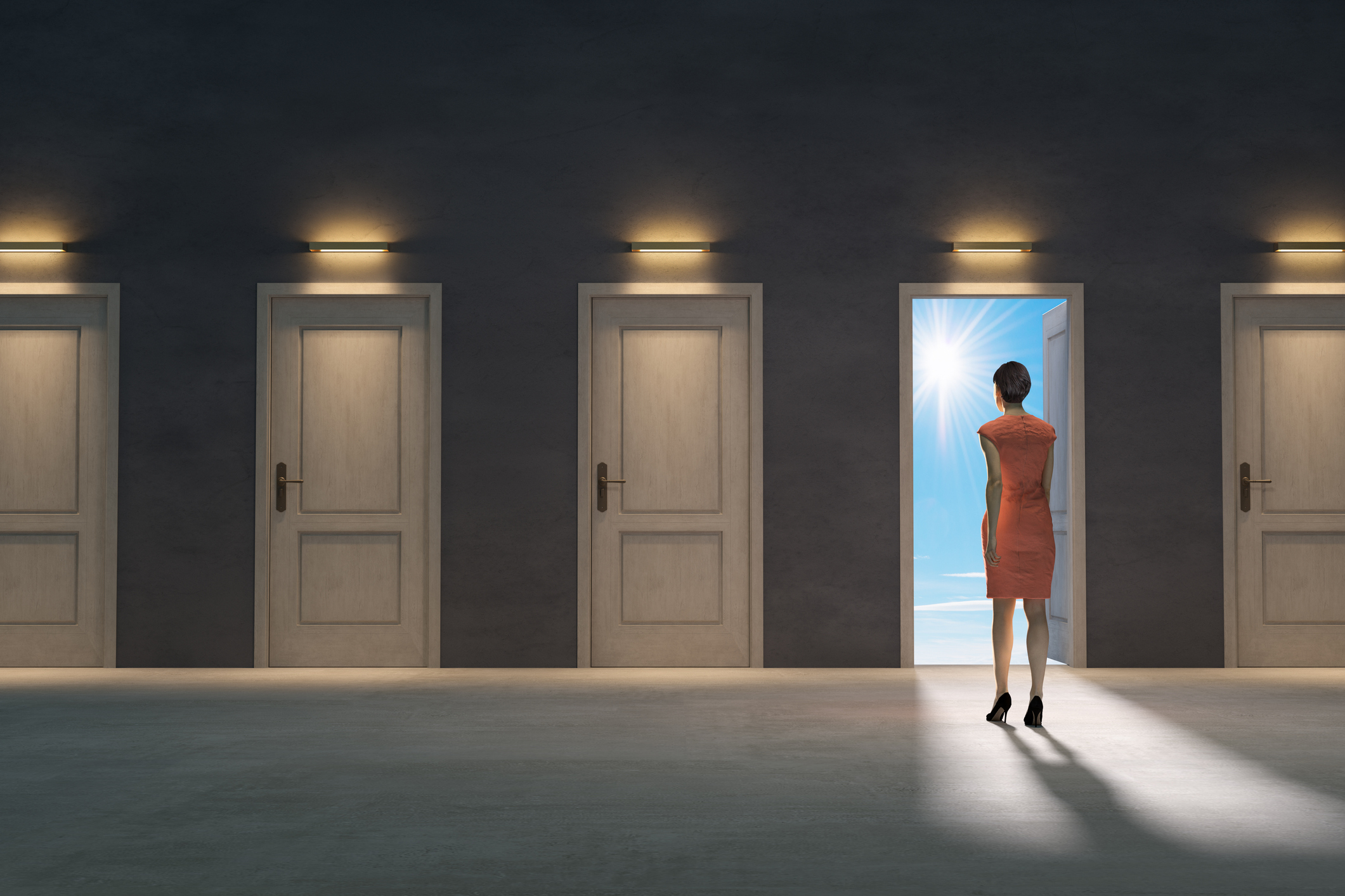 Person choosing from multiple doors to walk through.