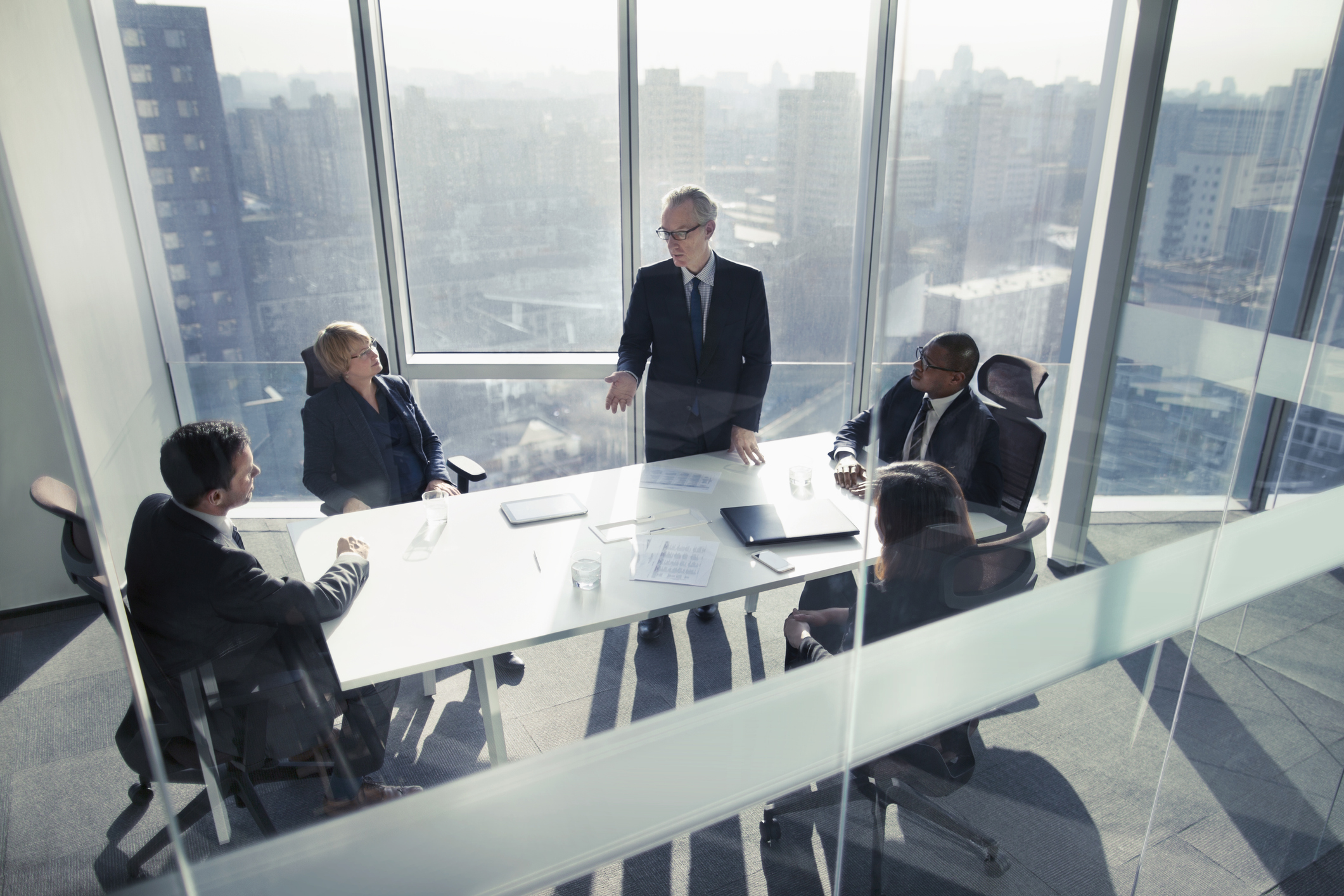People meeting in conference room.