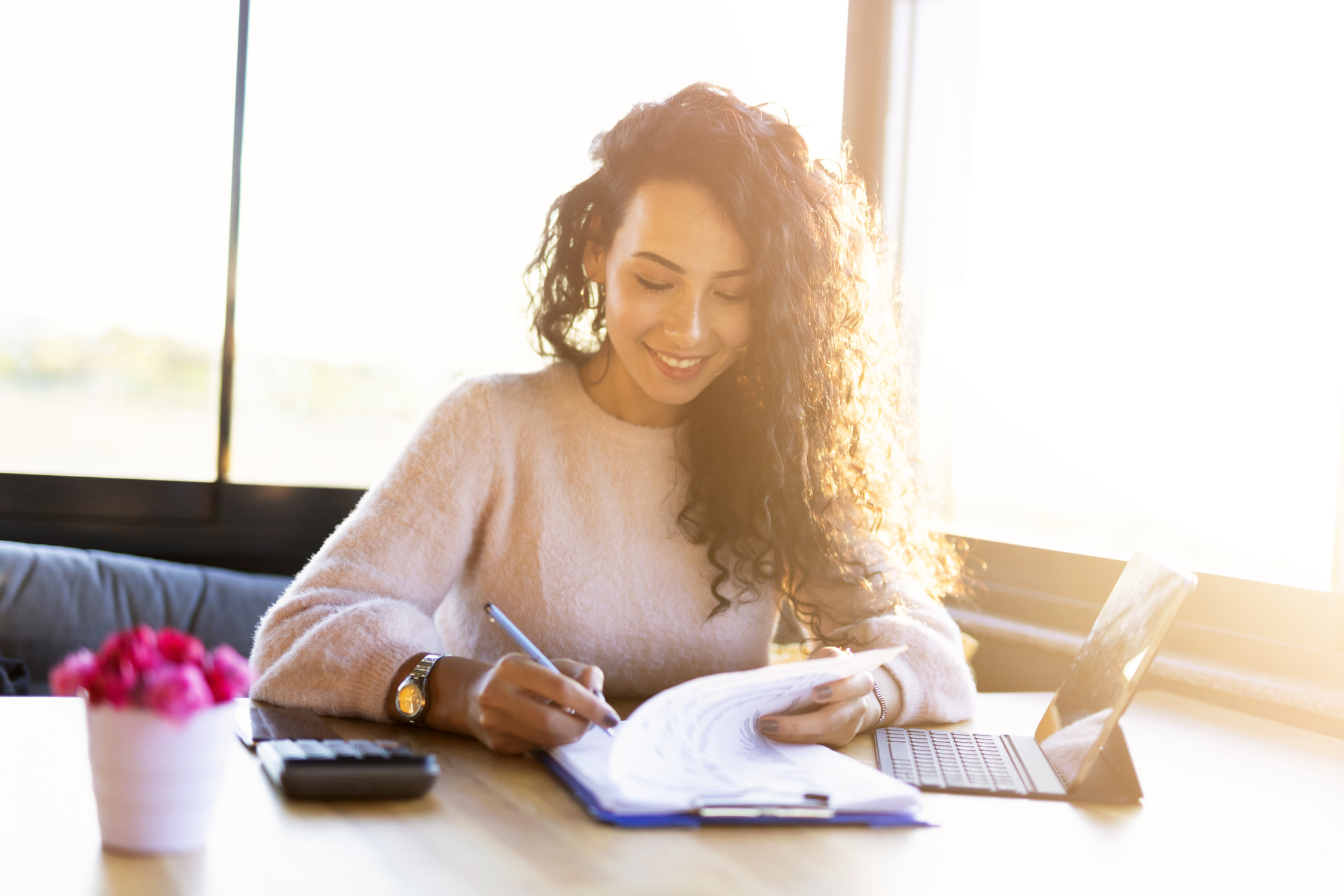 Woman reviewing paperwork for a gig job.